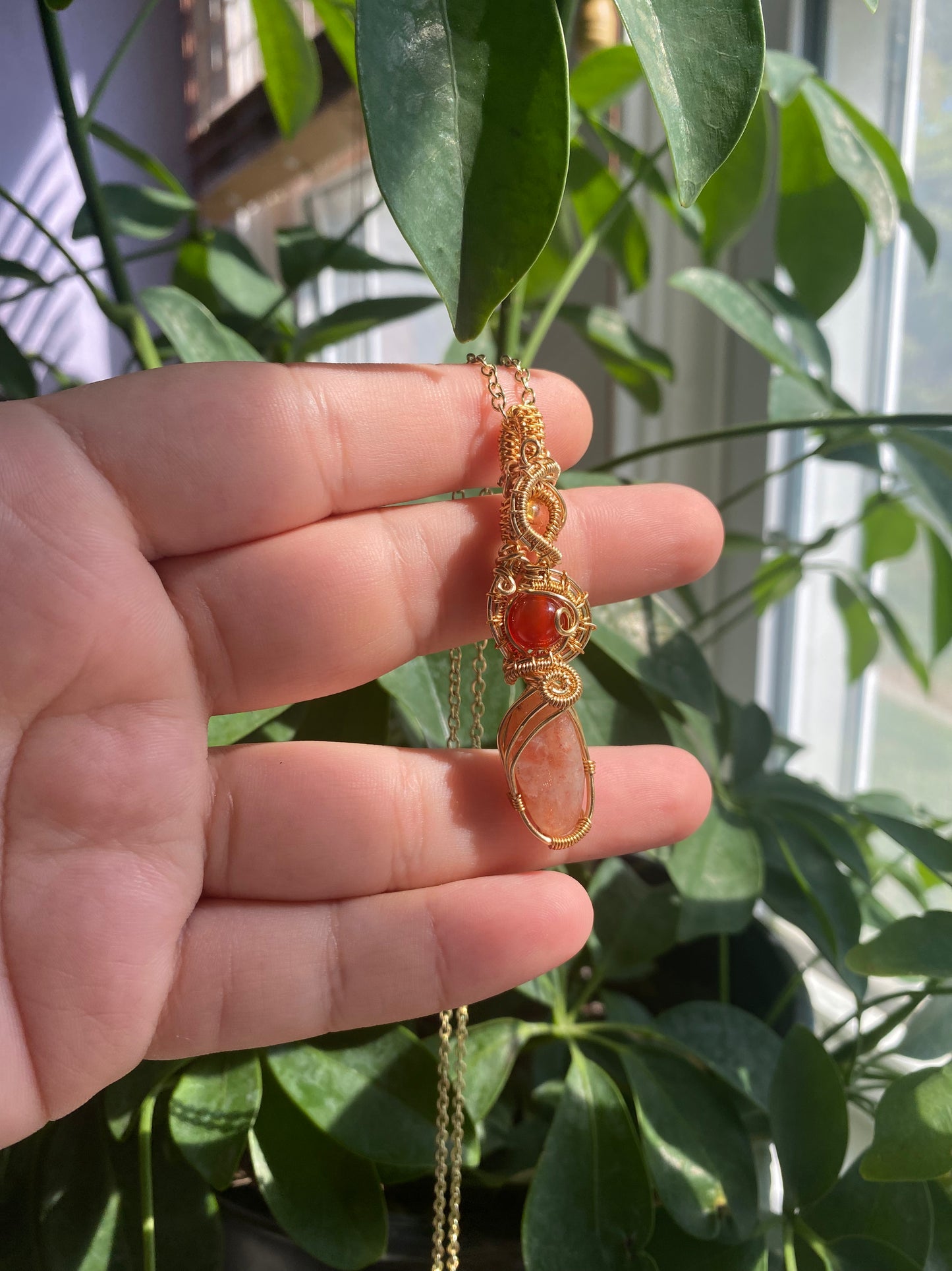 Joyous Carnelian, Sunstone, and Amethyst Citrine Crystal Pendant