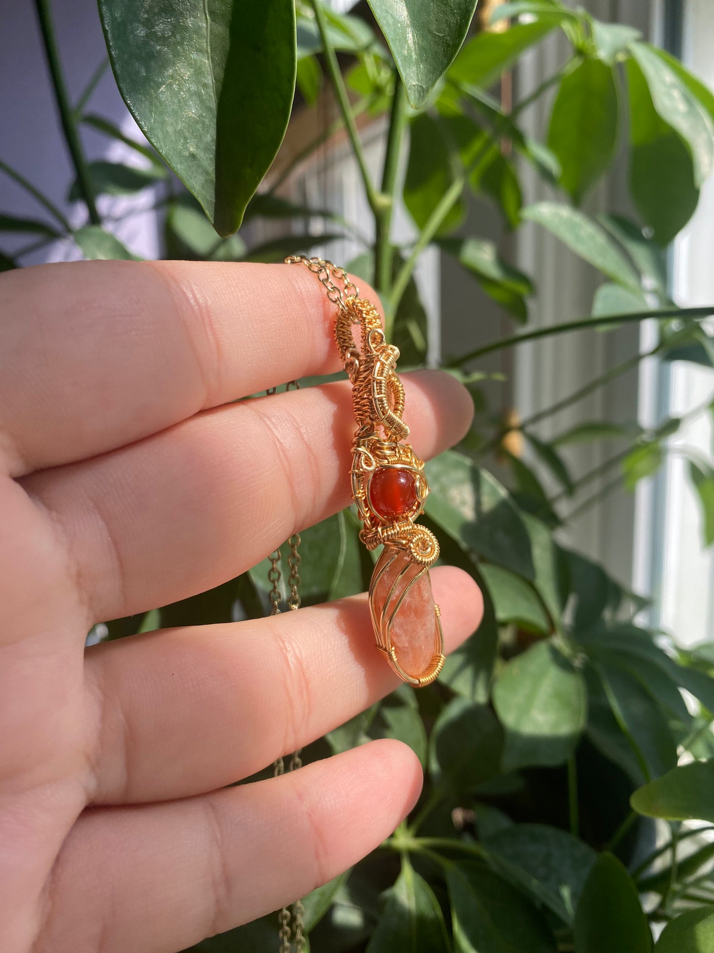 Joyous Carnelian, Sunstone, and Amethyst Citrine Crystal Pendant