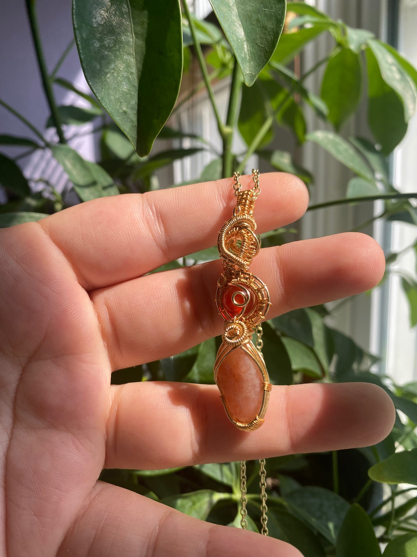 Joyous Carnelian, Sunstone, and Amethyst Citrine Crystal Pendant