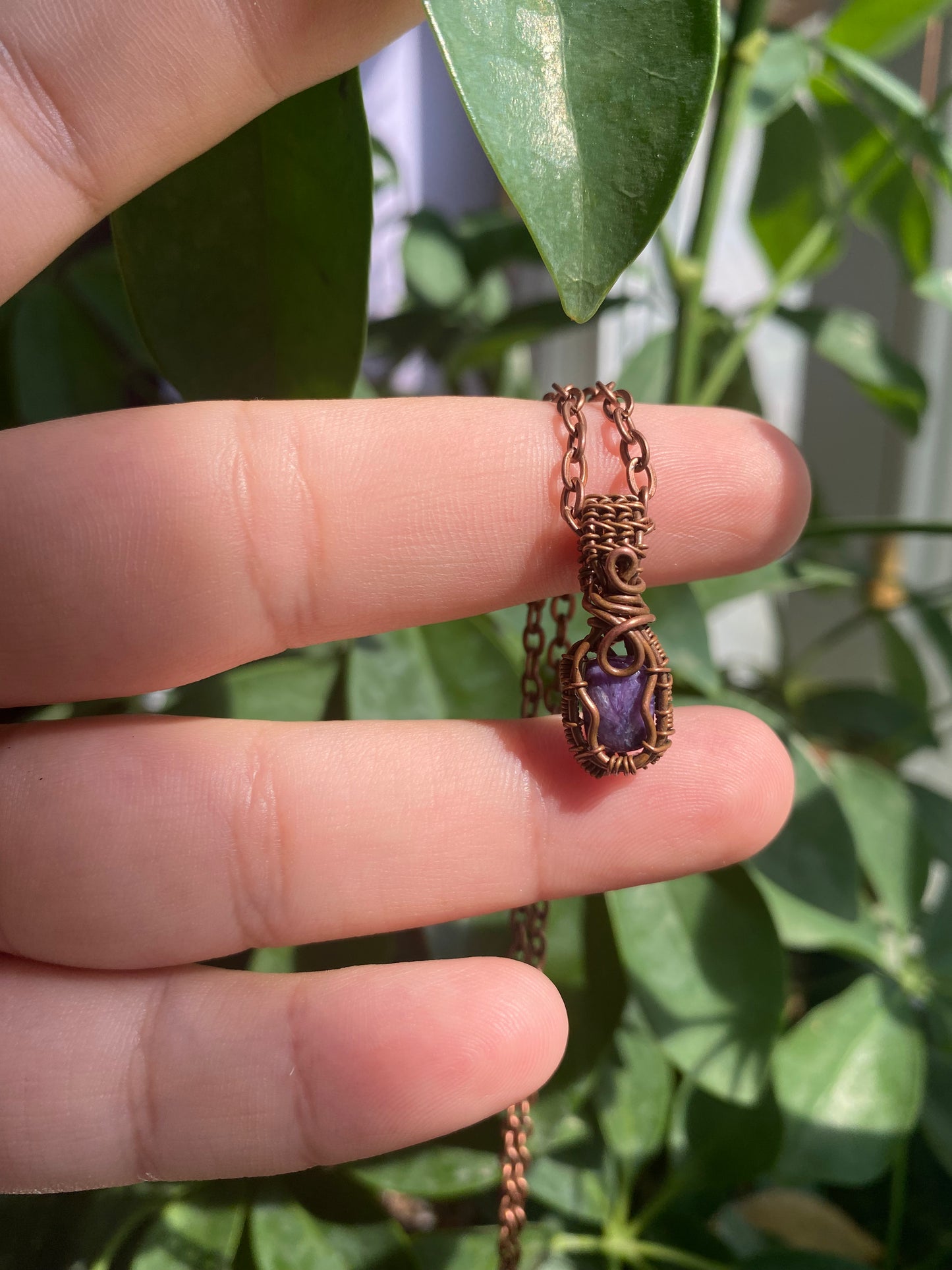 Charoite Crystal Pendant - A Miniature Work of Art
