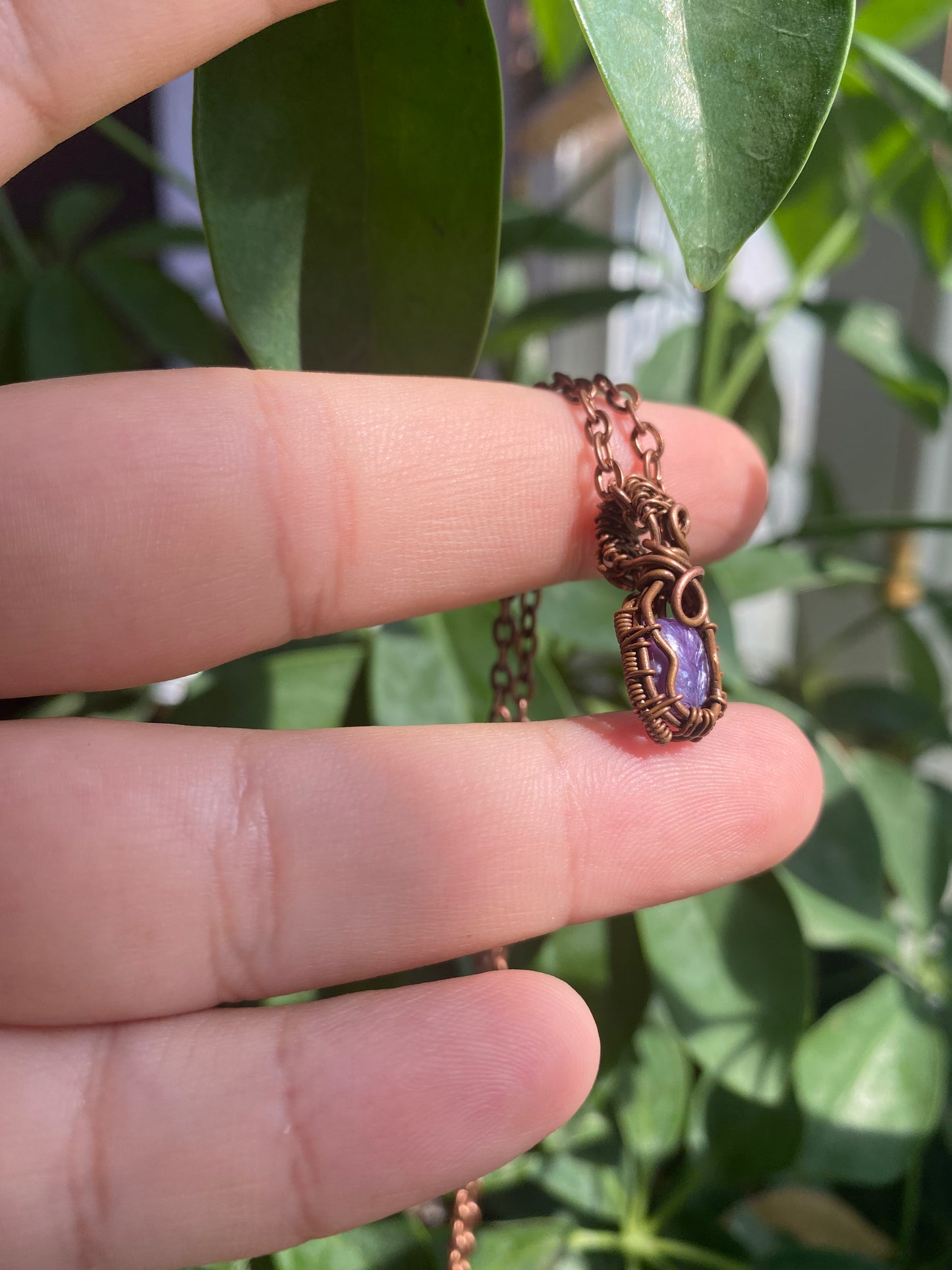 Charoite Crystal Pendant - A Miniature Work of Art