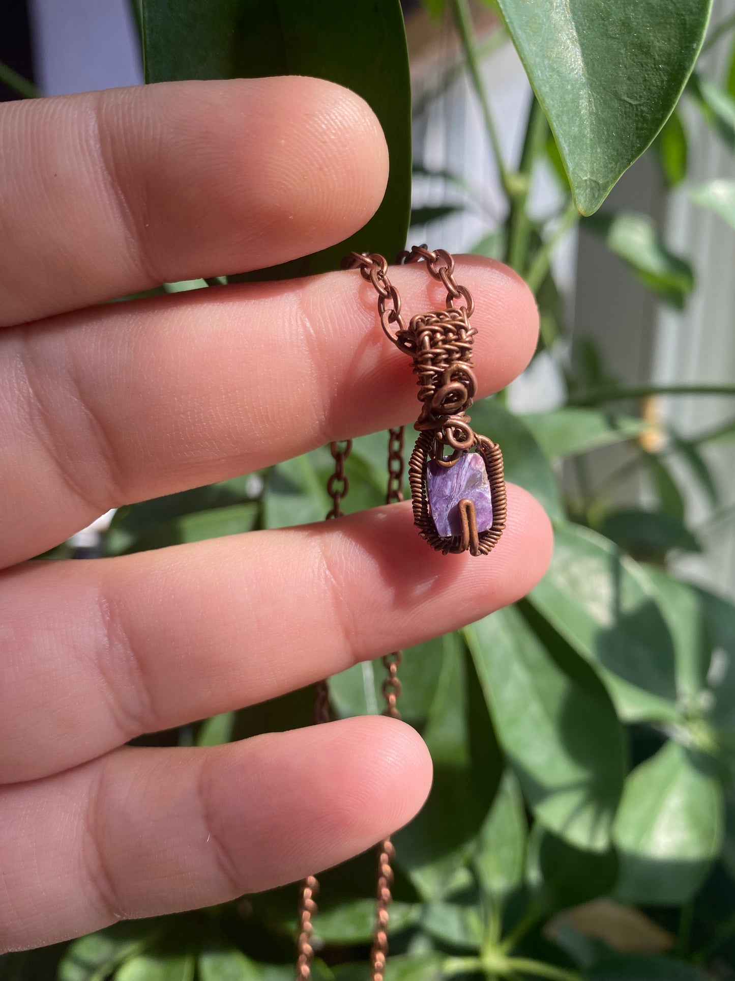 Charoite Crystal Pendant - A Miniature Work of Art