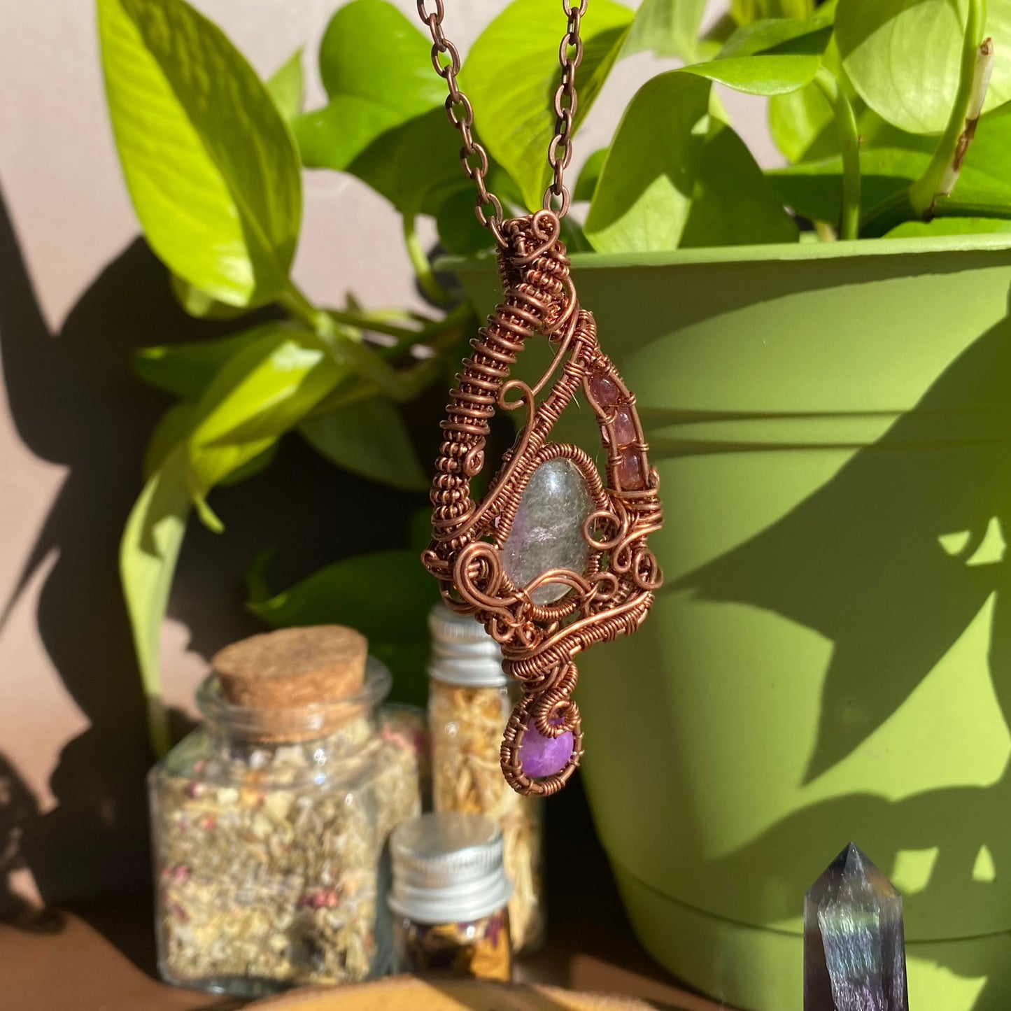 Harmony in Copper: Wire-Wrapped Flourite, Sugilite, and Strawberry Quartz Pendant
