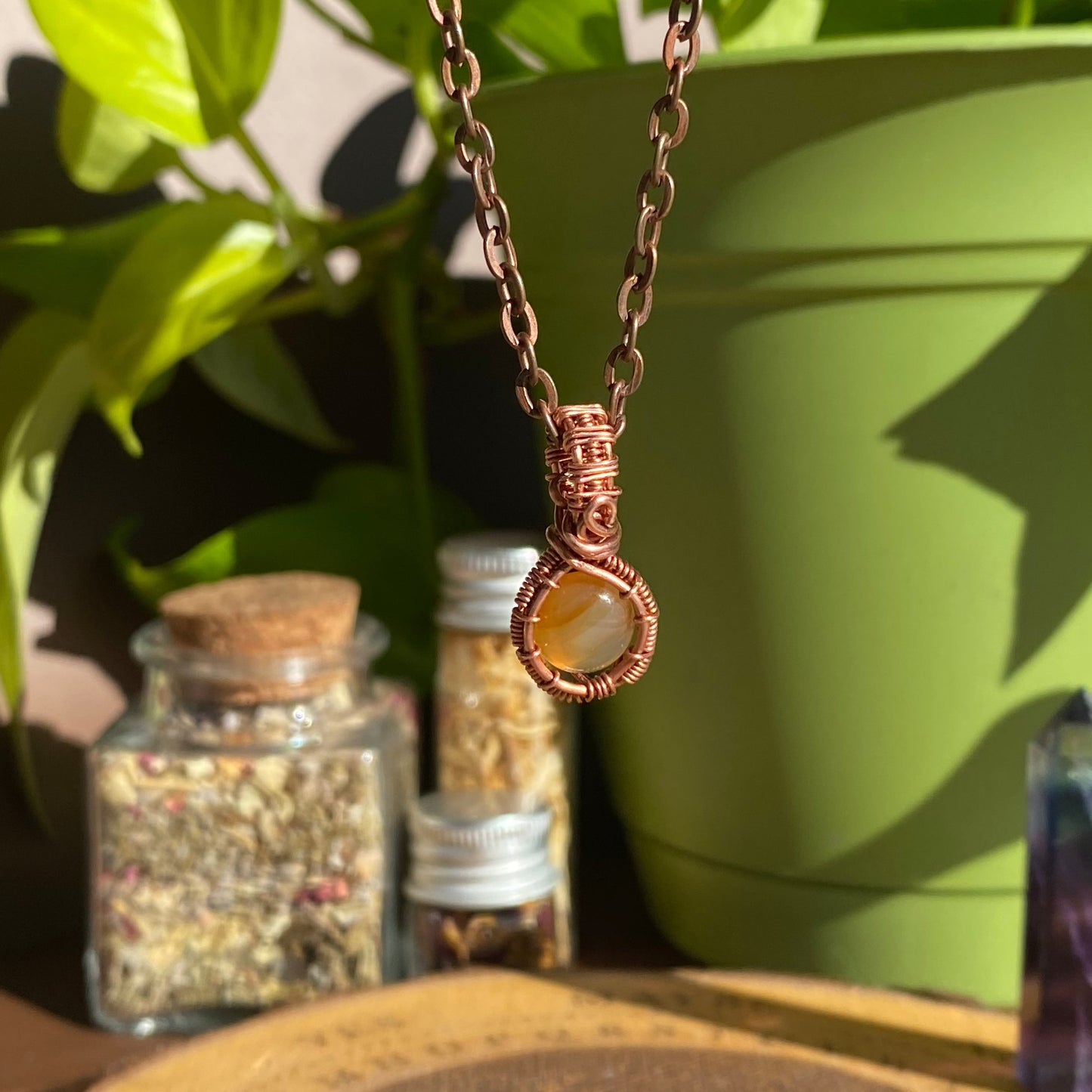 Dainty Elegance: Handcrafted Wire-Wrapped Pendant with Cherry Quartz