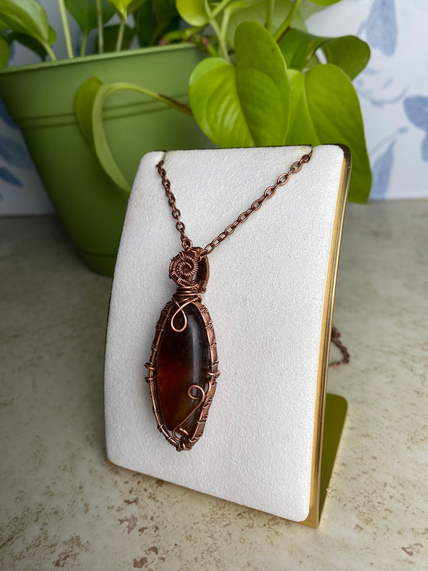 Amber Elegance: Handcrafted Wire-Wrapped Pendant in Copper