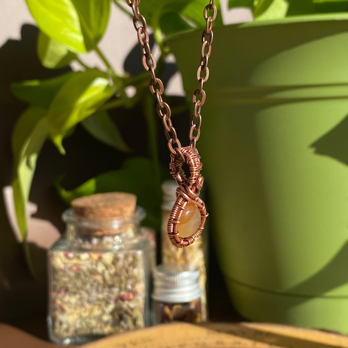 Dainty Elegance: Handcrafted Wire-Wrapped Pendant with Cherry Quartz